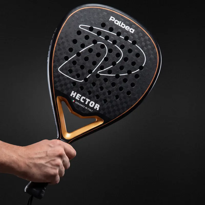 Hand holding a Palbea racket, handle detail