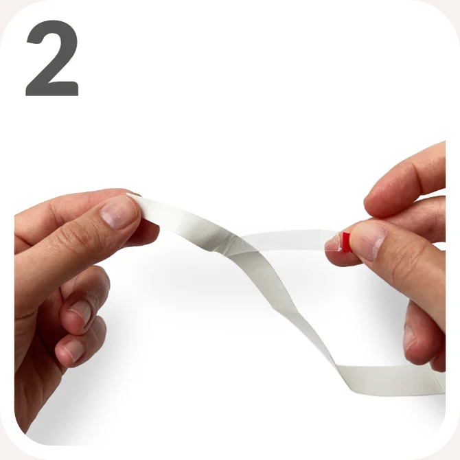 Step 2 — Remove the transparent film running along the overgrip.