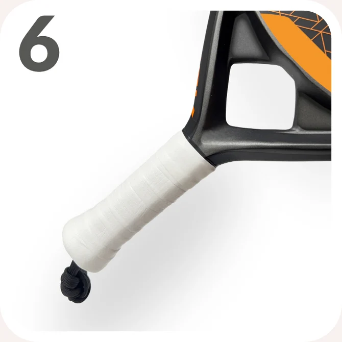 Step 6 — Work up to the top of the handle and, if needed, trim off the excess overgrip.
