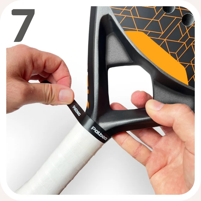 Step 7 — Wrap the black finishing tape around the end of the overgrip.