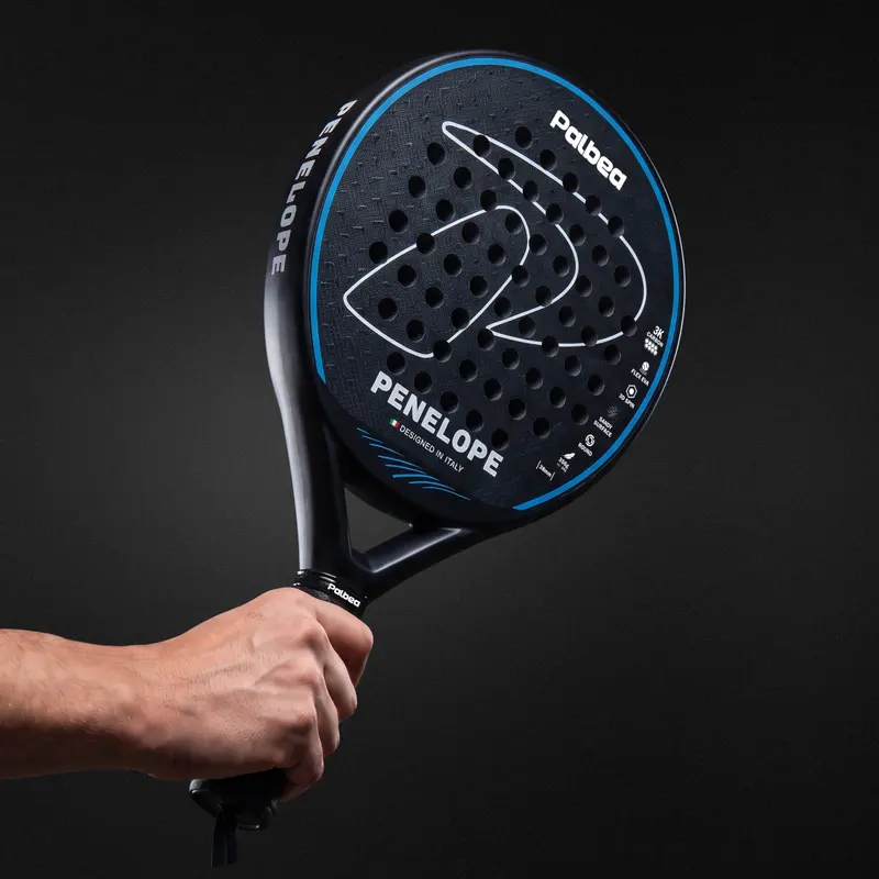 Hand holding a Palbea racket, handle detail